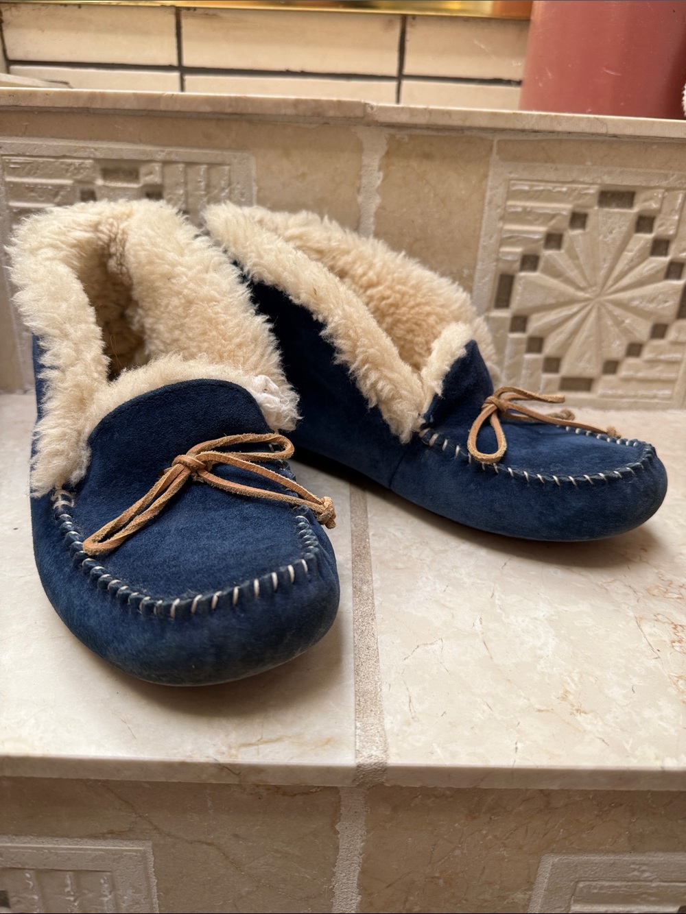 UGG Navy Suede women’s Moccasin Slippers with Cream Fur Trim